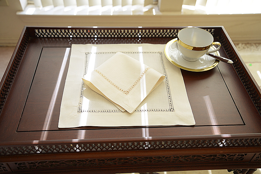 12" square placemat, pearled Ivory color. hemstitch