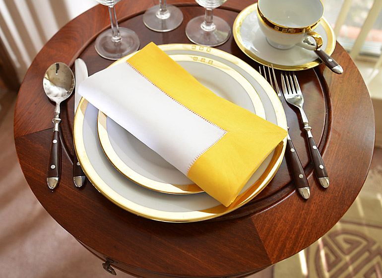 Hemstitch Napkin. White with Kumquat Border