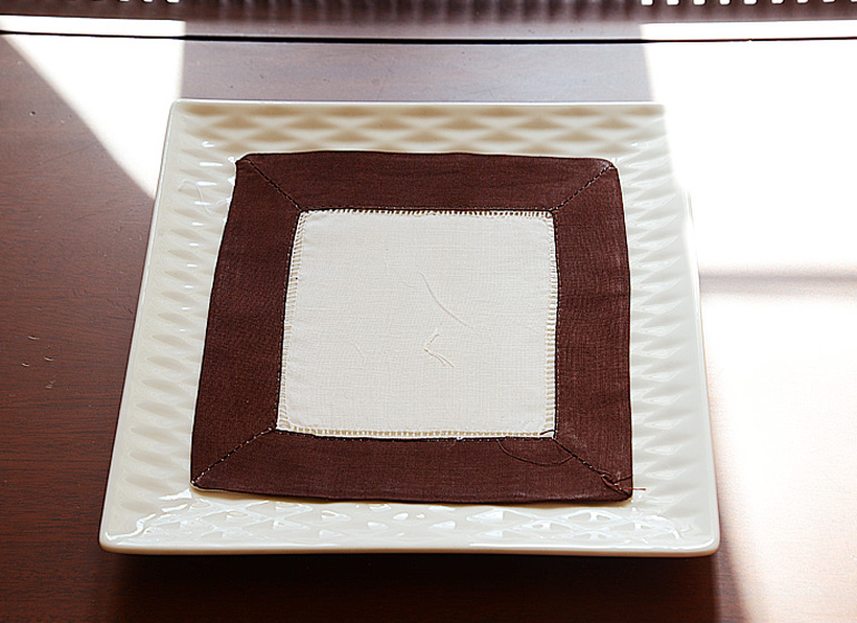 Almond with brown border.