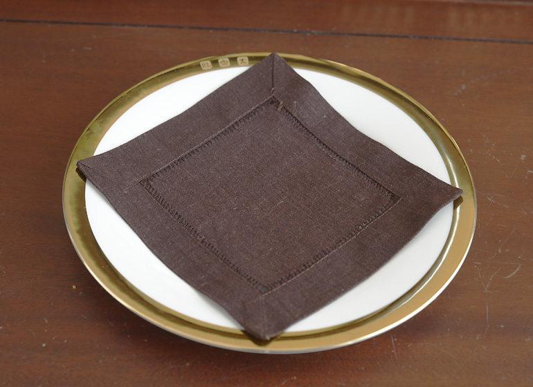Chocolate color hemstitch cocktail napkin.