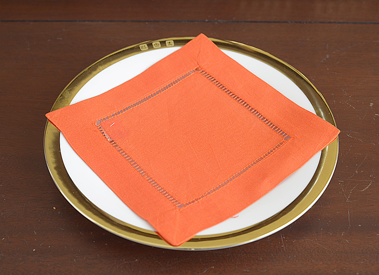Hot Orange color hemstitch cocktail napkin.
