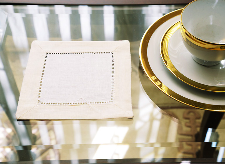 hemstitch cocktail napkin, White with Coconut Milk color border.